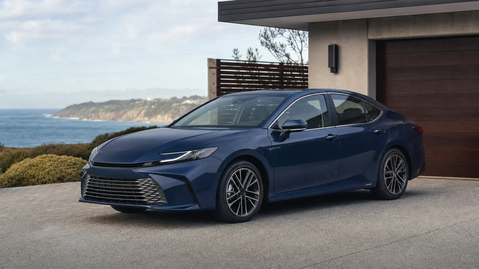 Editorial illustration for Toyota Camry Recall Turns a Small Screen Into a Safety Issue
