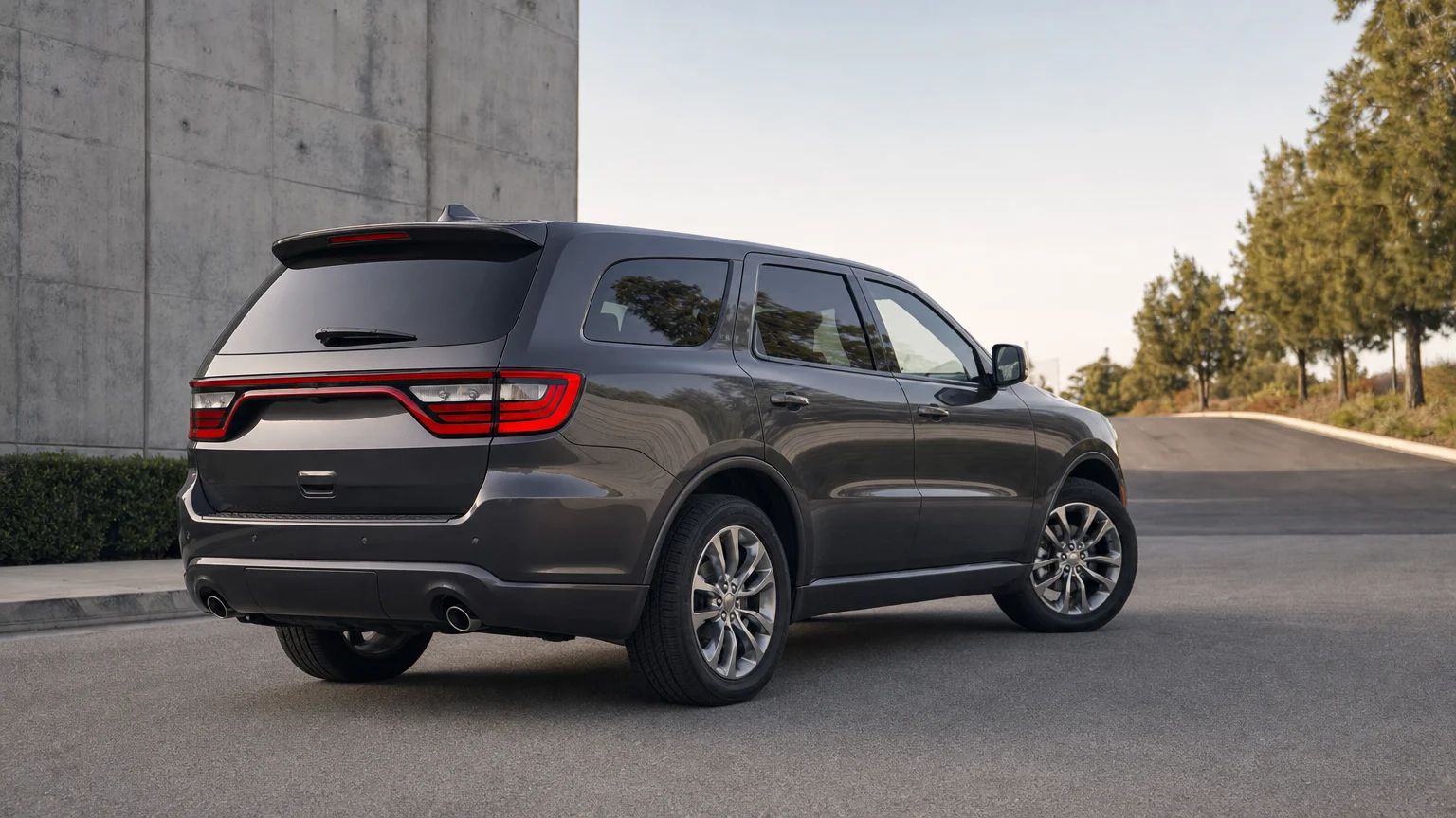 Editorial illustration for Dodge Durango Spoiler Recall Revisits Earlier Repairs